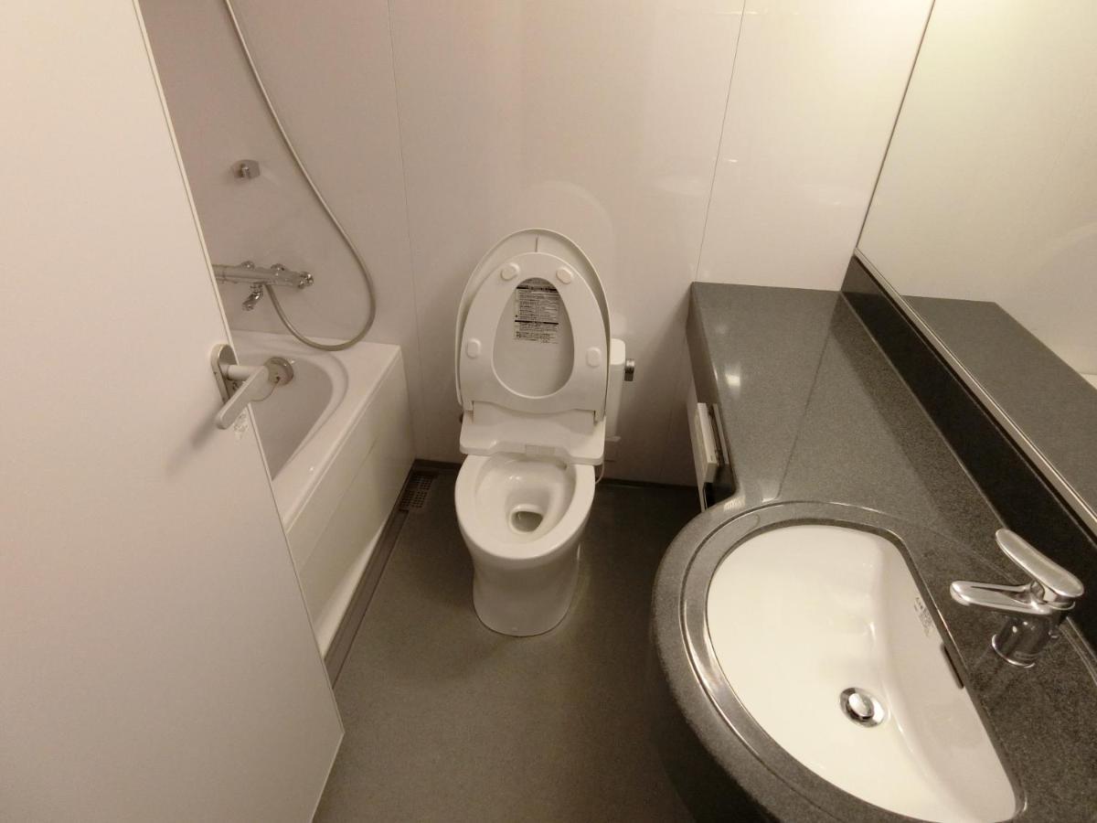 טוקיו Studio Inn Nishi Shinjuku מראה חיצוני תמונה