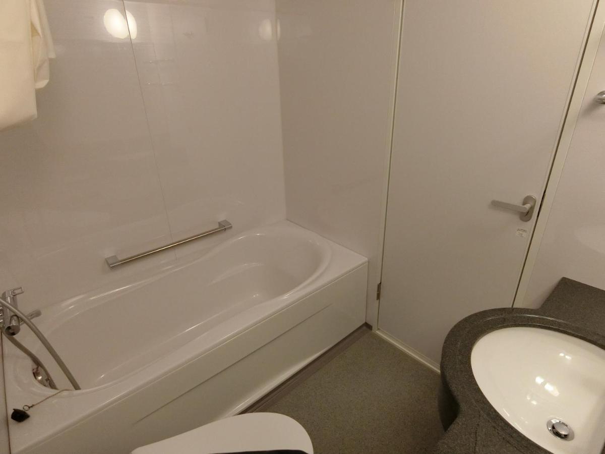 טוקיו Studio Inn Nishi Shinjuku מראה חיצוני תמונה