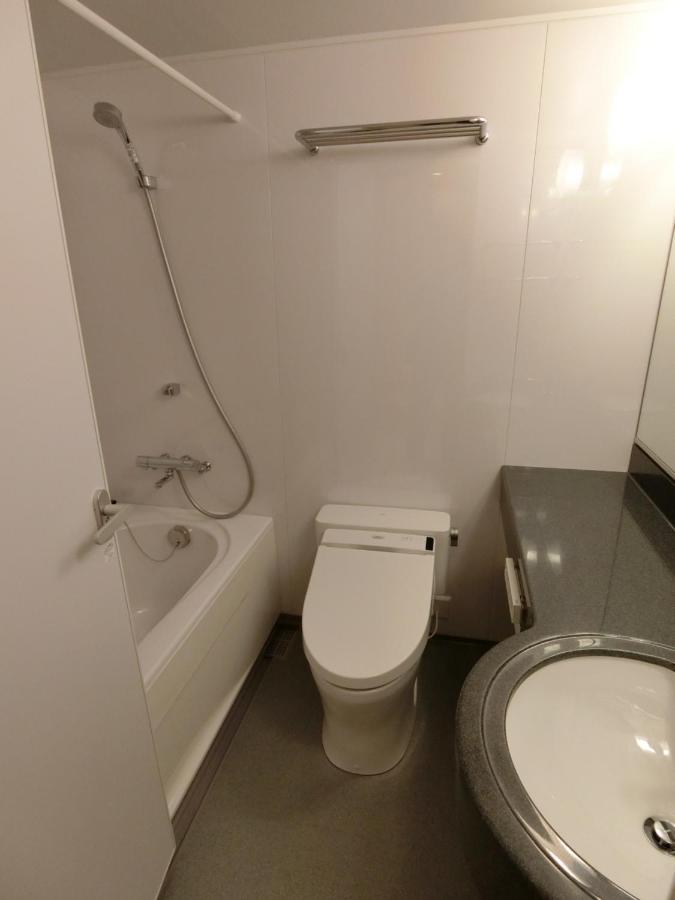 טוקיו Studio Inn Nishi Shinjuku מראה חיצוני תמונה