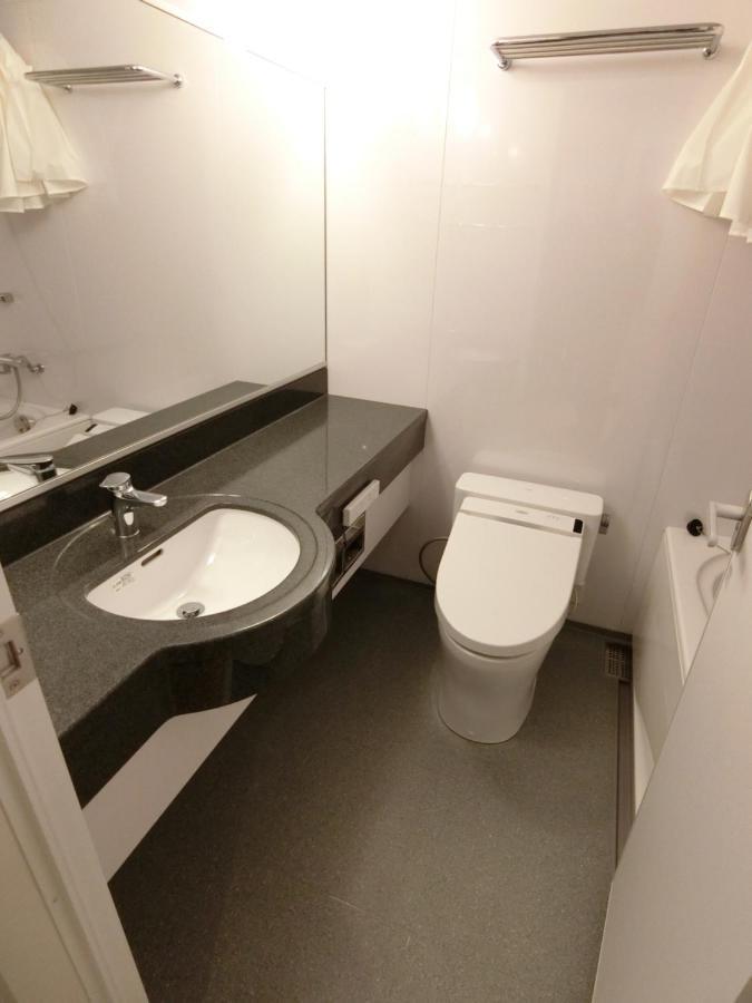 טוקיו Studio Inn Nishi Shinjuku מראה חיצוני תמונה