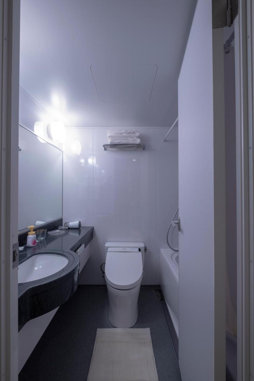 טוקיו Studio Inn Nishi Shinjuku מראה חיצוני תמונה